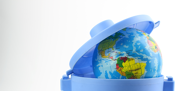 Globe of the world in a plastic bin