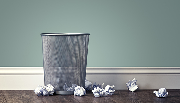 Bin with paper in it